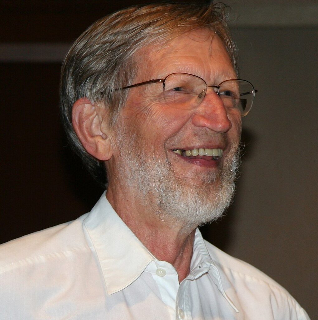 Filosoof Alvin Plantinga glimlachend tijdens een lezing over wetenschap en religie aan de Mayo Clinic in Rochester, Minnesota.